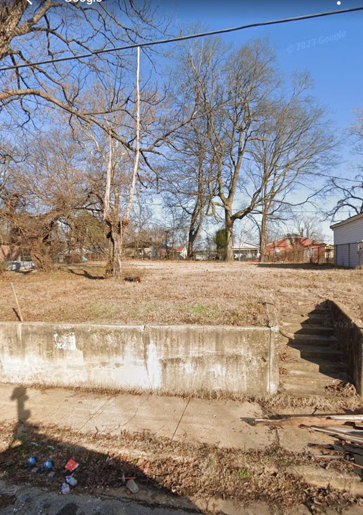 a view of a yard with an outdoor space