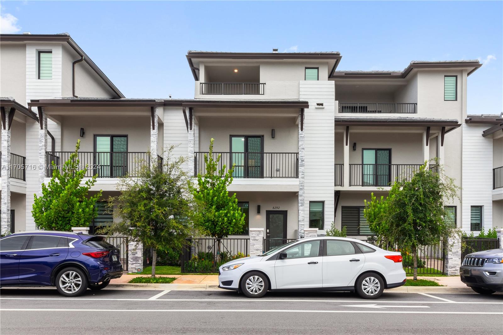 a car parked in front of a house