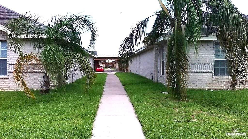 View of home's exterior with a yard