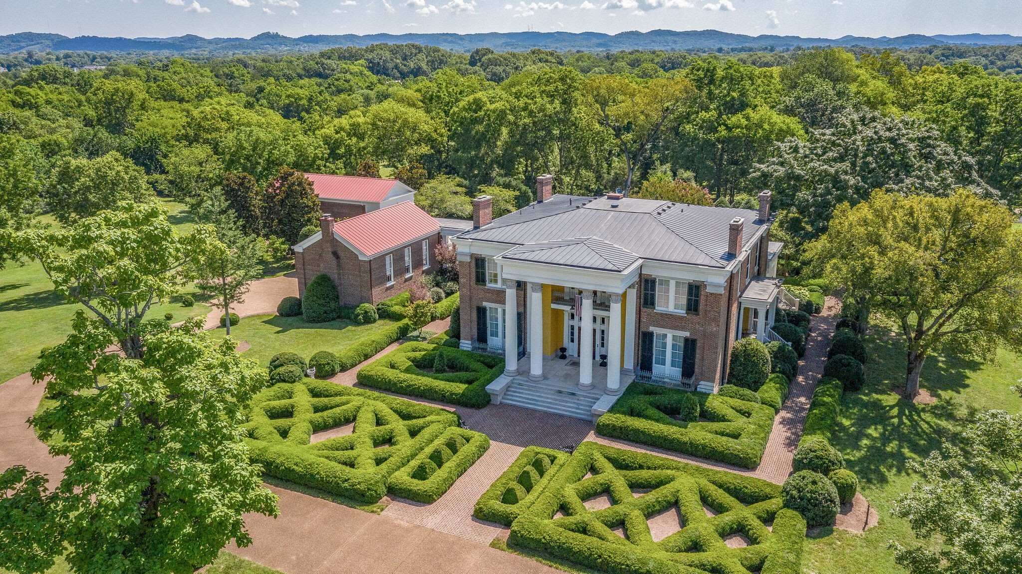 a aerial view of a house with garden