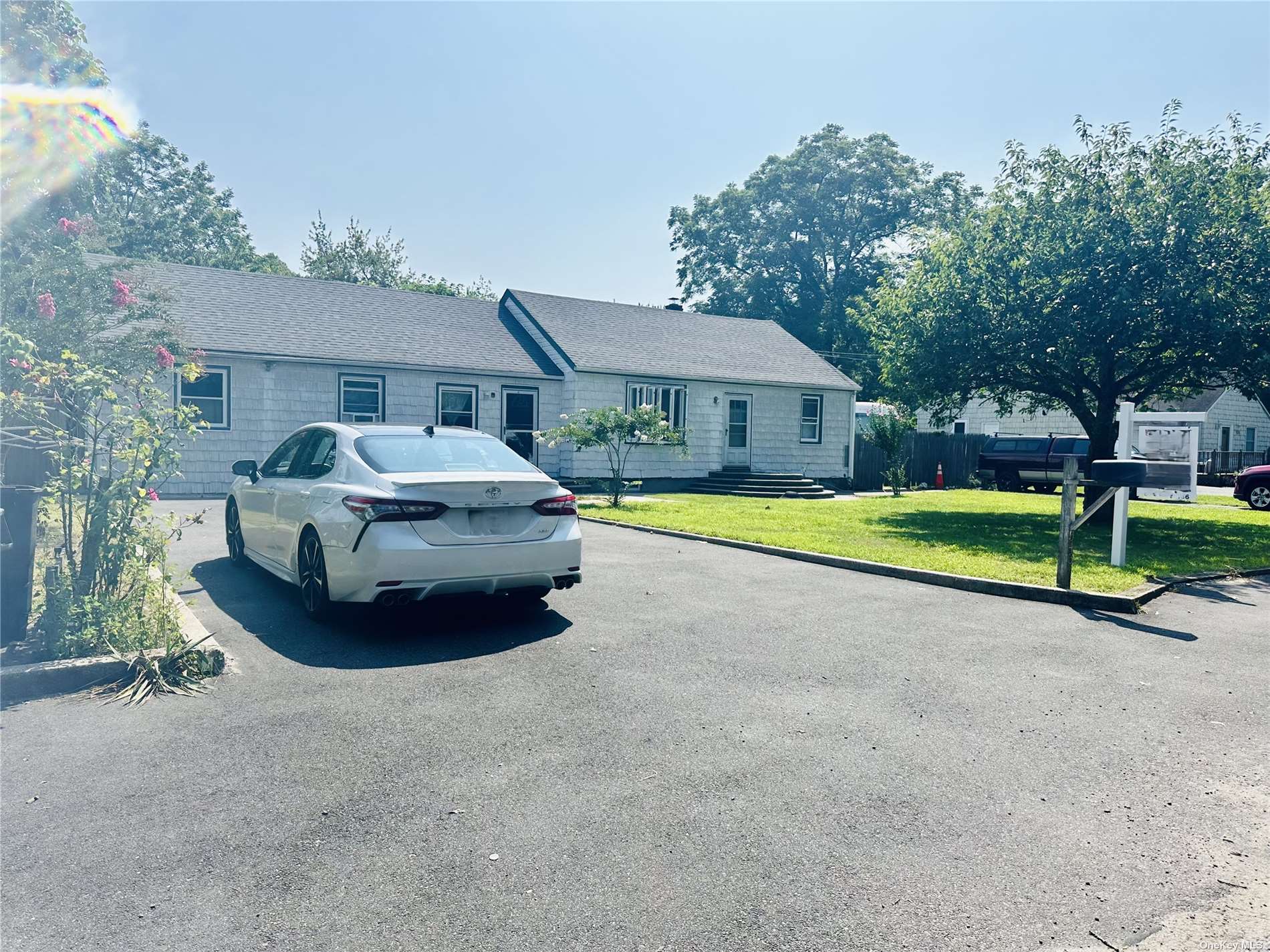 a car parked in front of a house