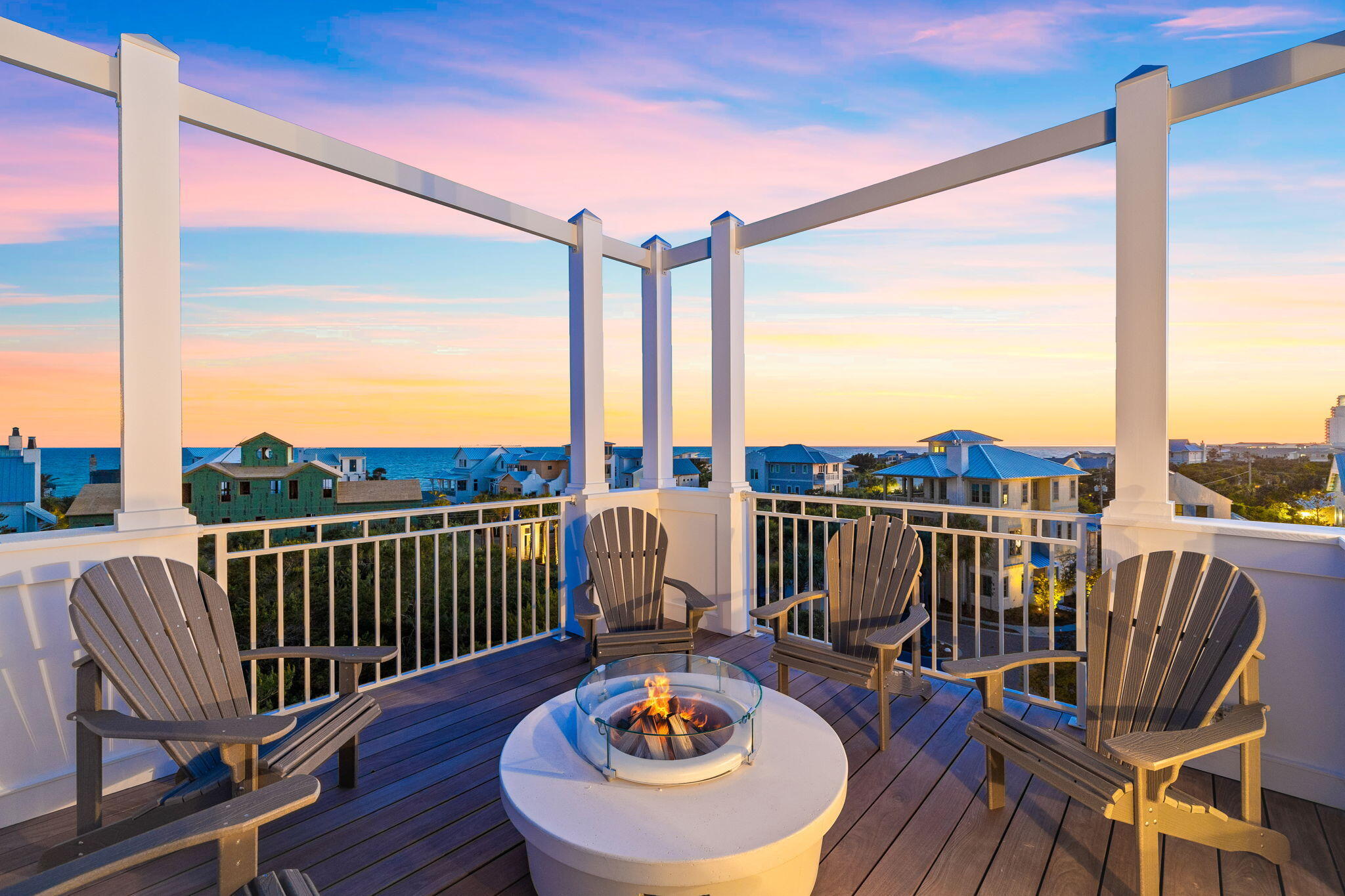 a view of a balcony with couch and wooden floor