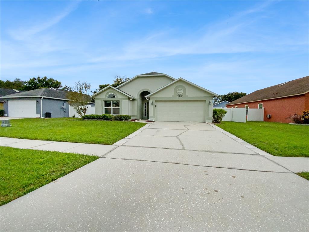 a front view of house with yard