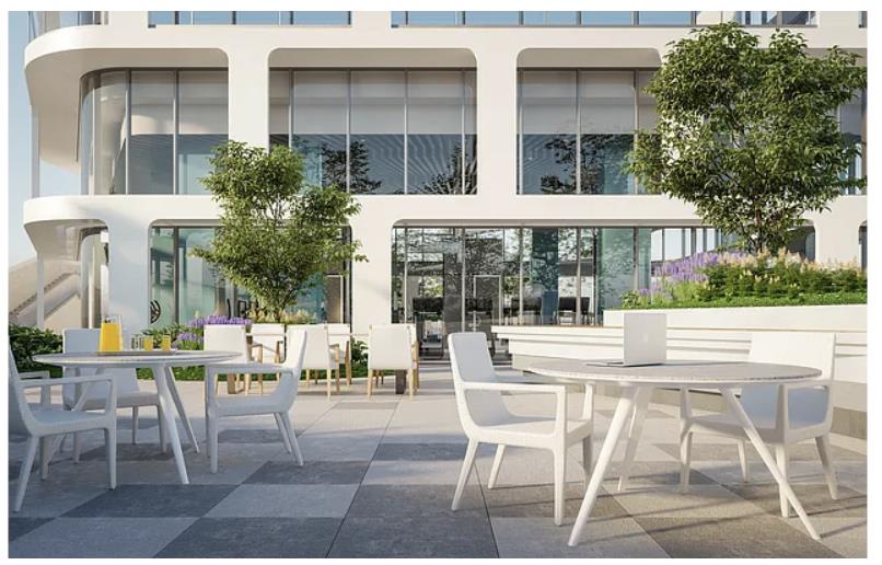 a view of a patio with couches table and chairs and potted plants