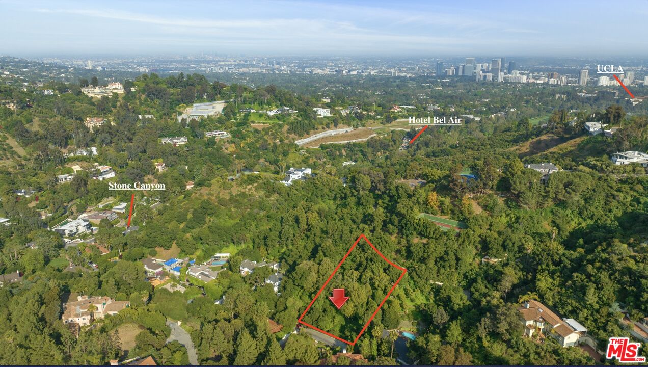 a view of city and green space