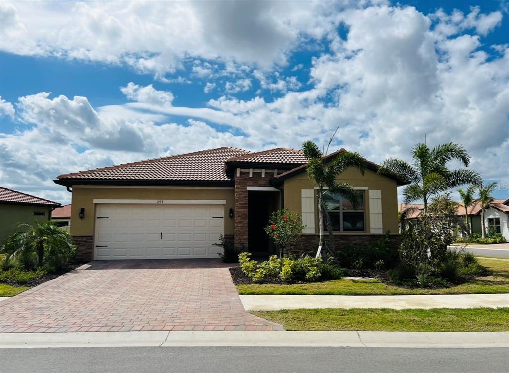 front view of house with a yard