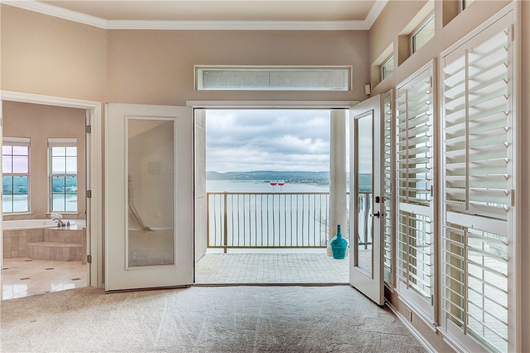 a view of a hallway with windows