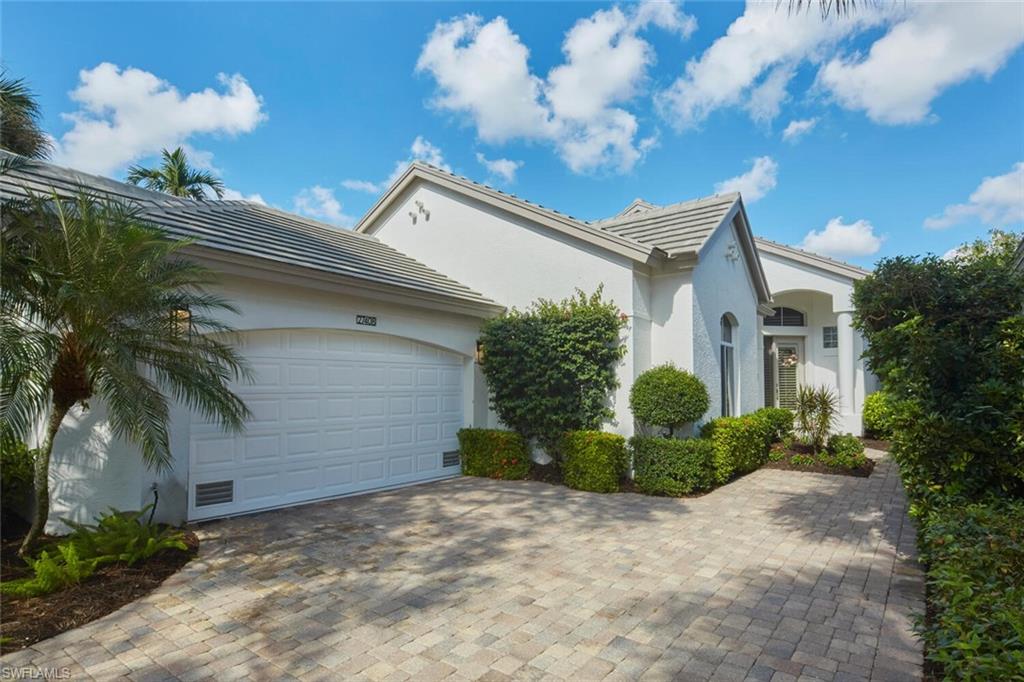 View of home's exterior with a garage