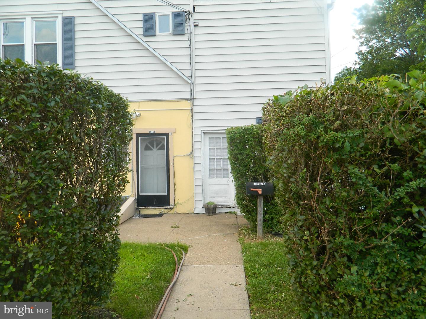 a view of a house with a small garden