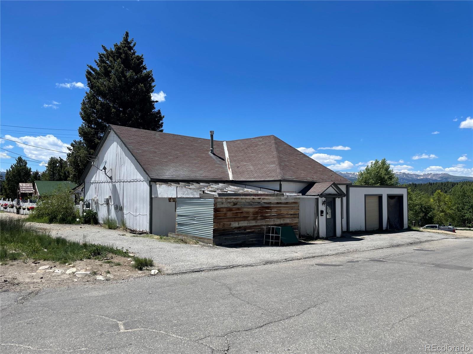 a view of a house with a garage