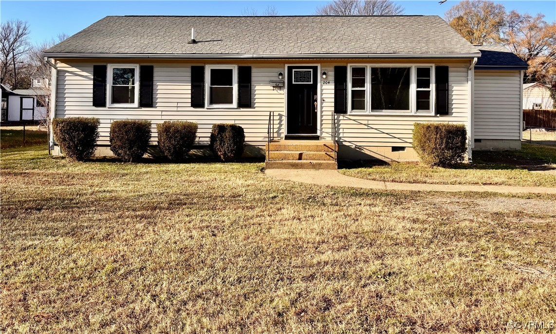 Single story home with a front lawn