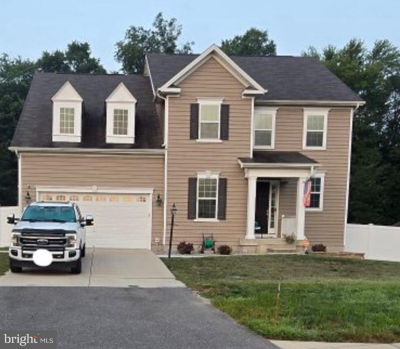 a car parked in front of a house