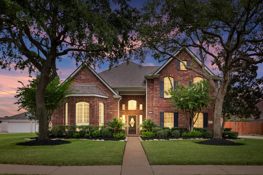 front view of house with a yard