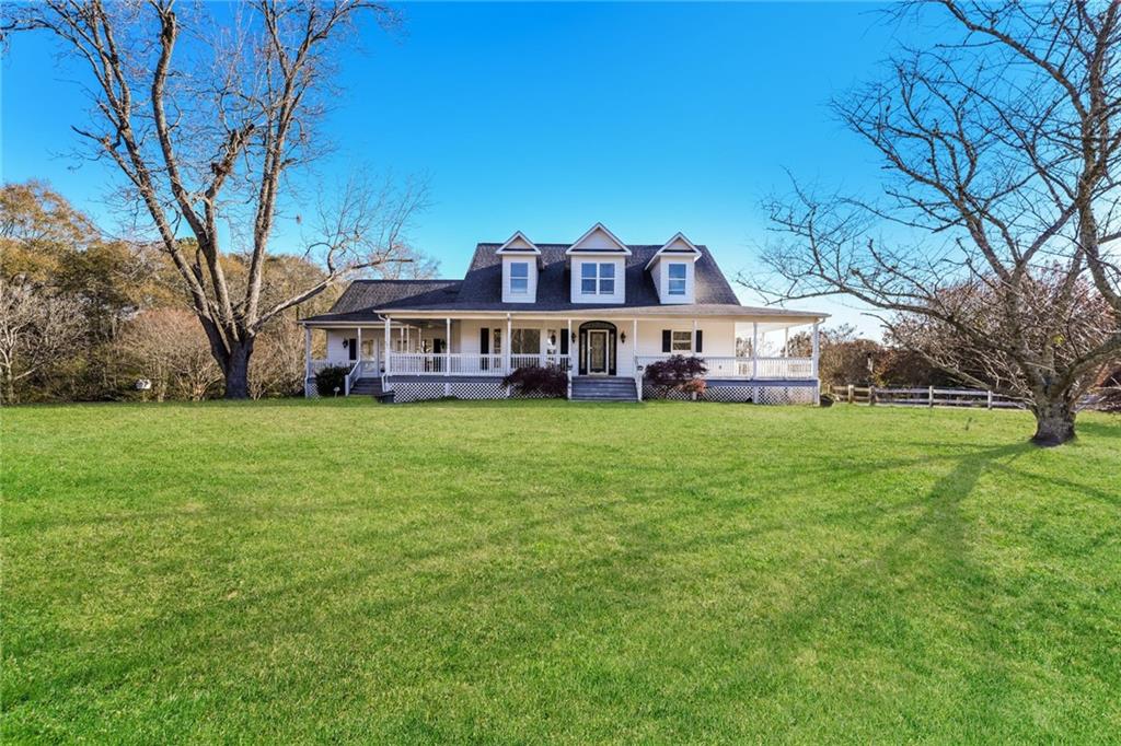 a view of a house with a big yard