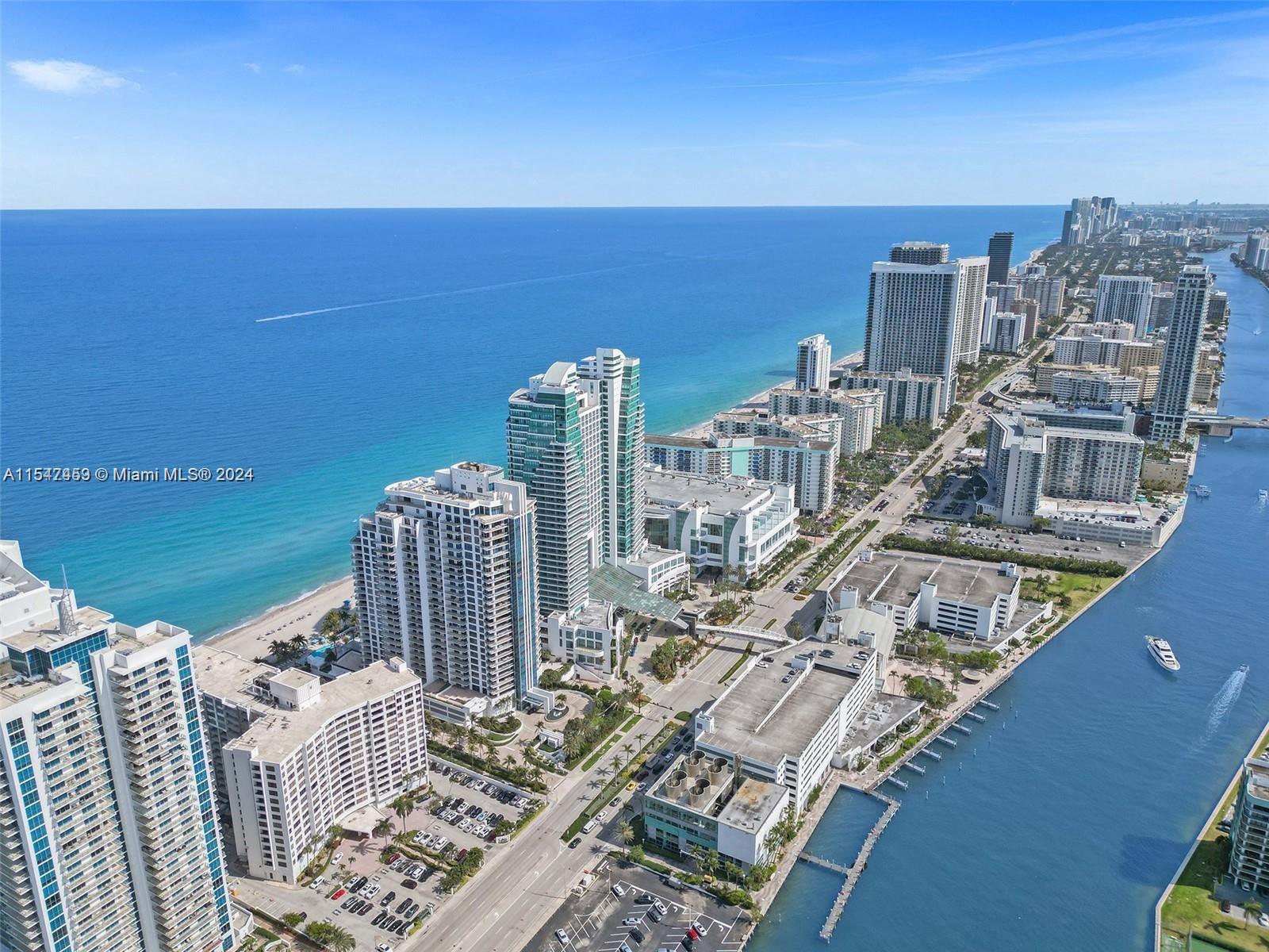 a view of city with ocean