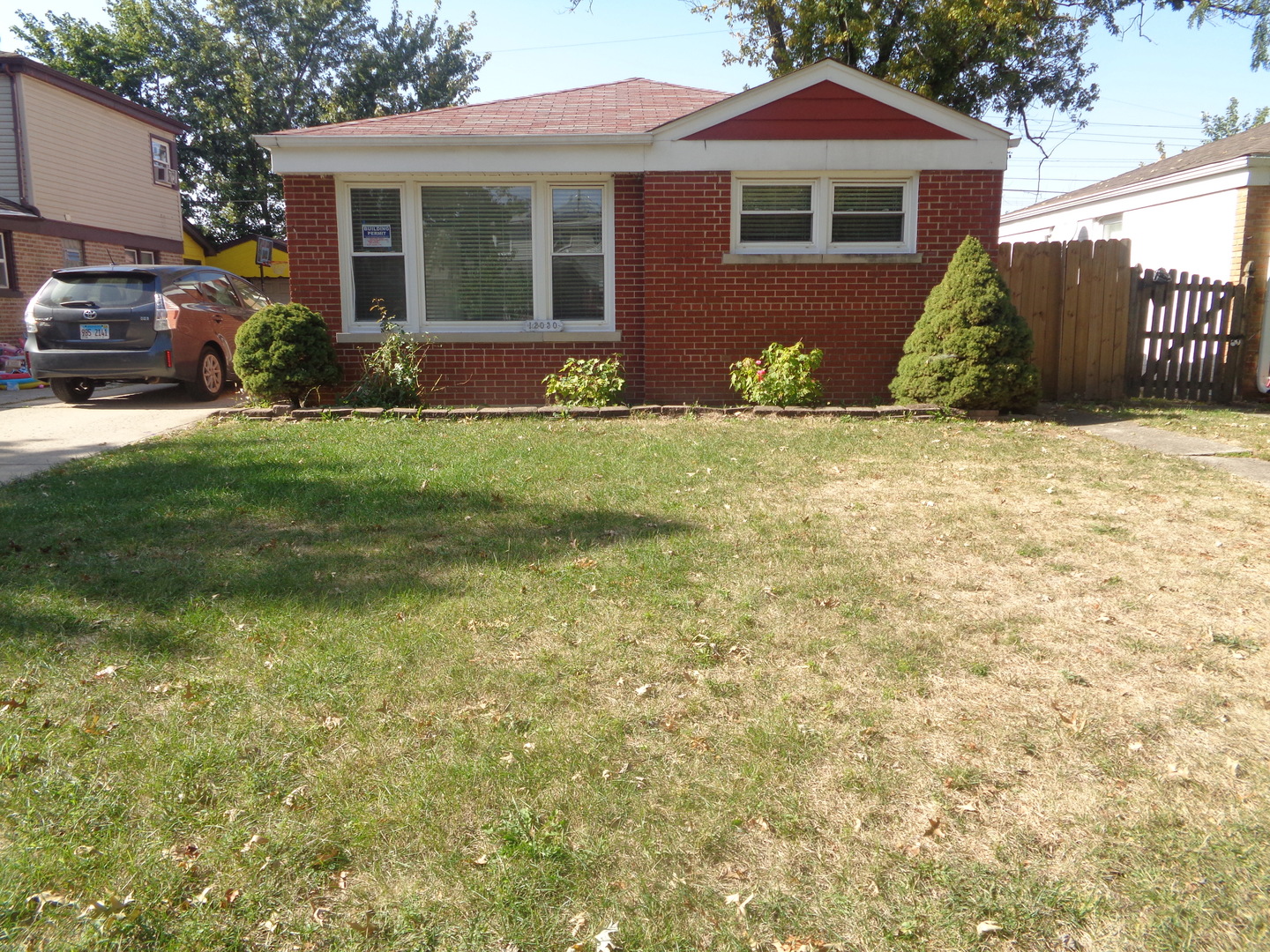 a view of a house with a garden