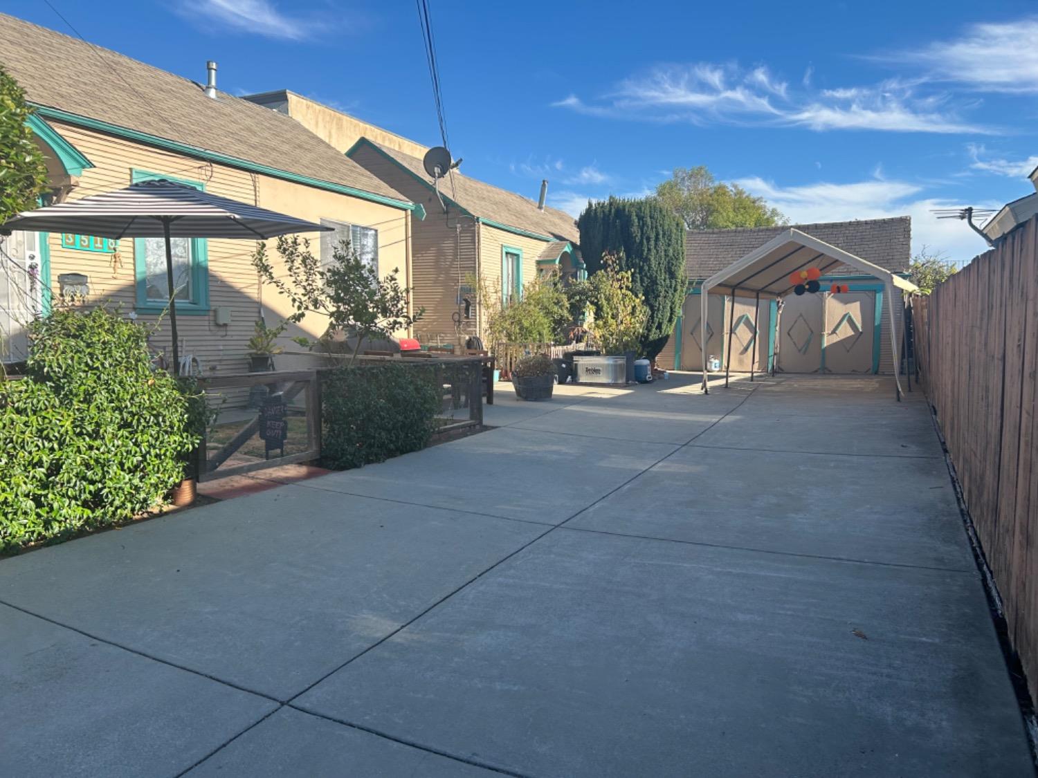 a view of a house with a street