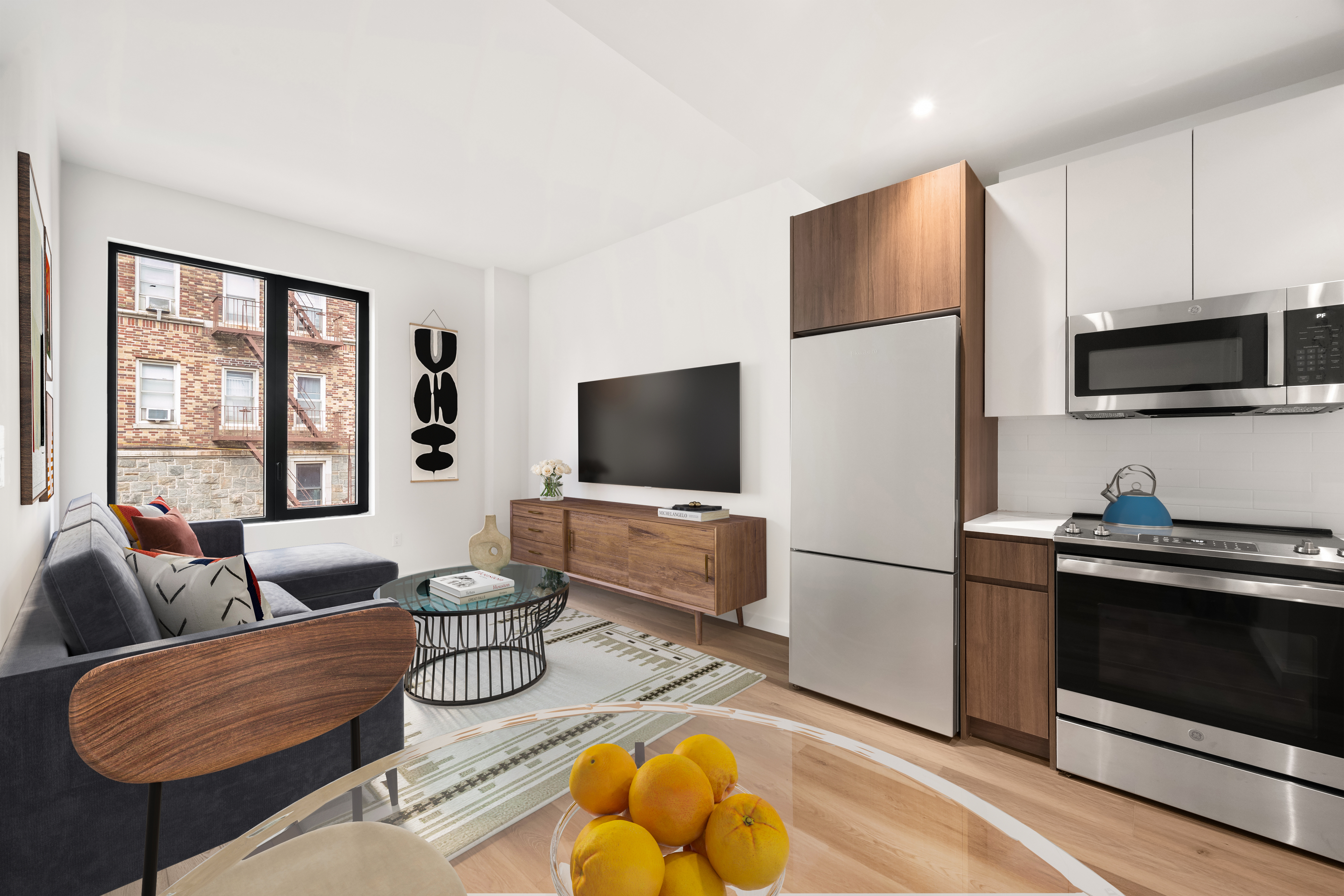 a living room with furniture and a flat screen tv