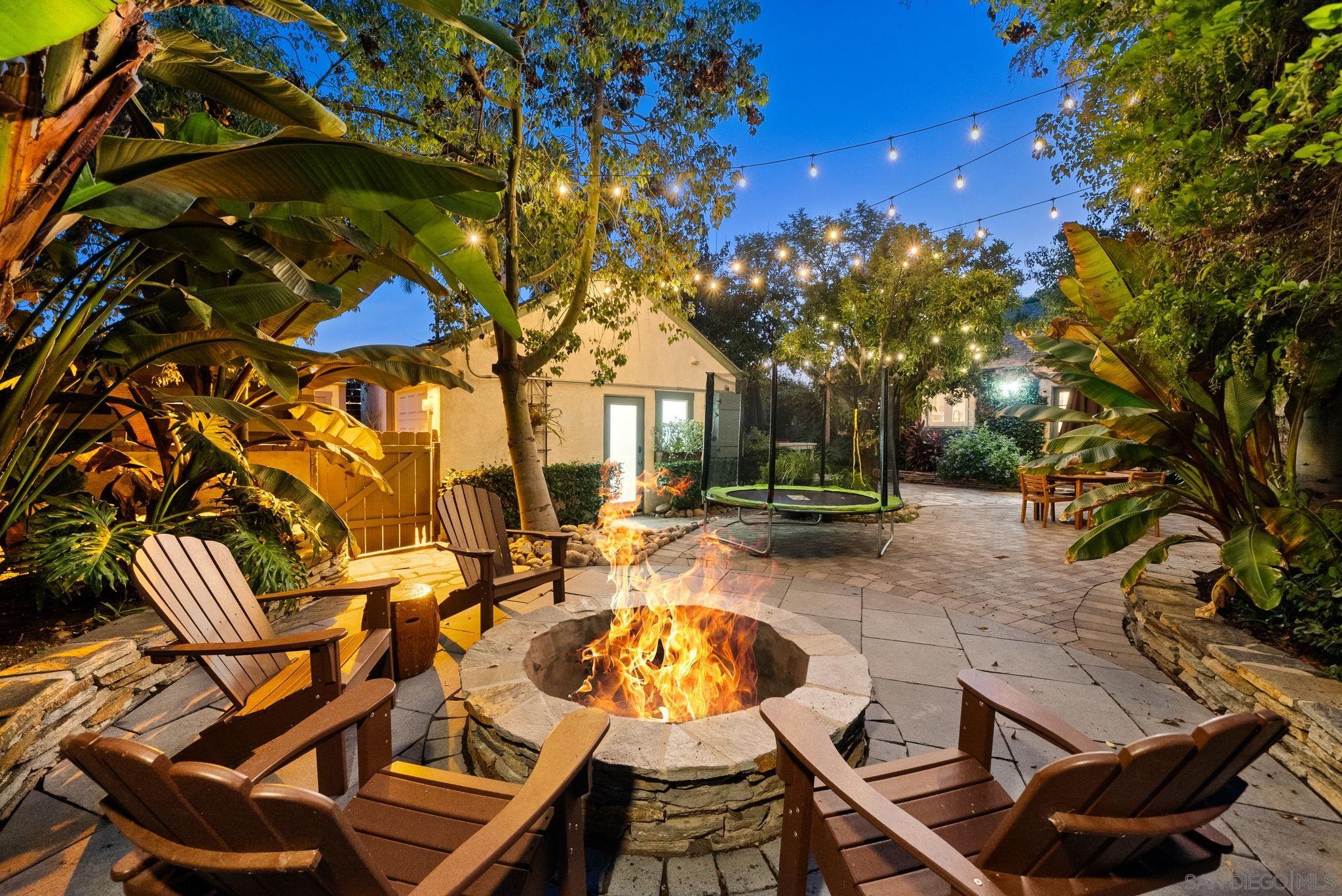 a view of a patio with swimming pool