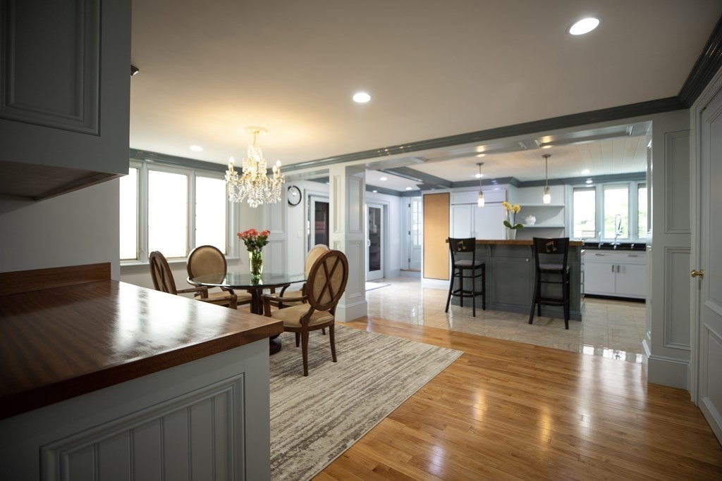 a lobby with furniture and wooden floor