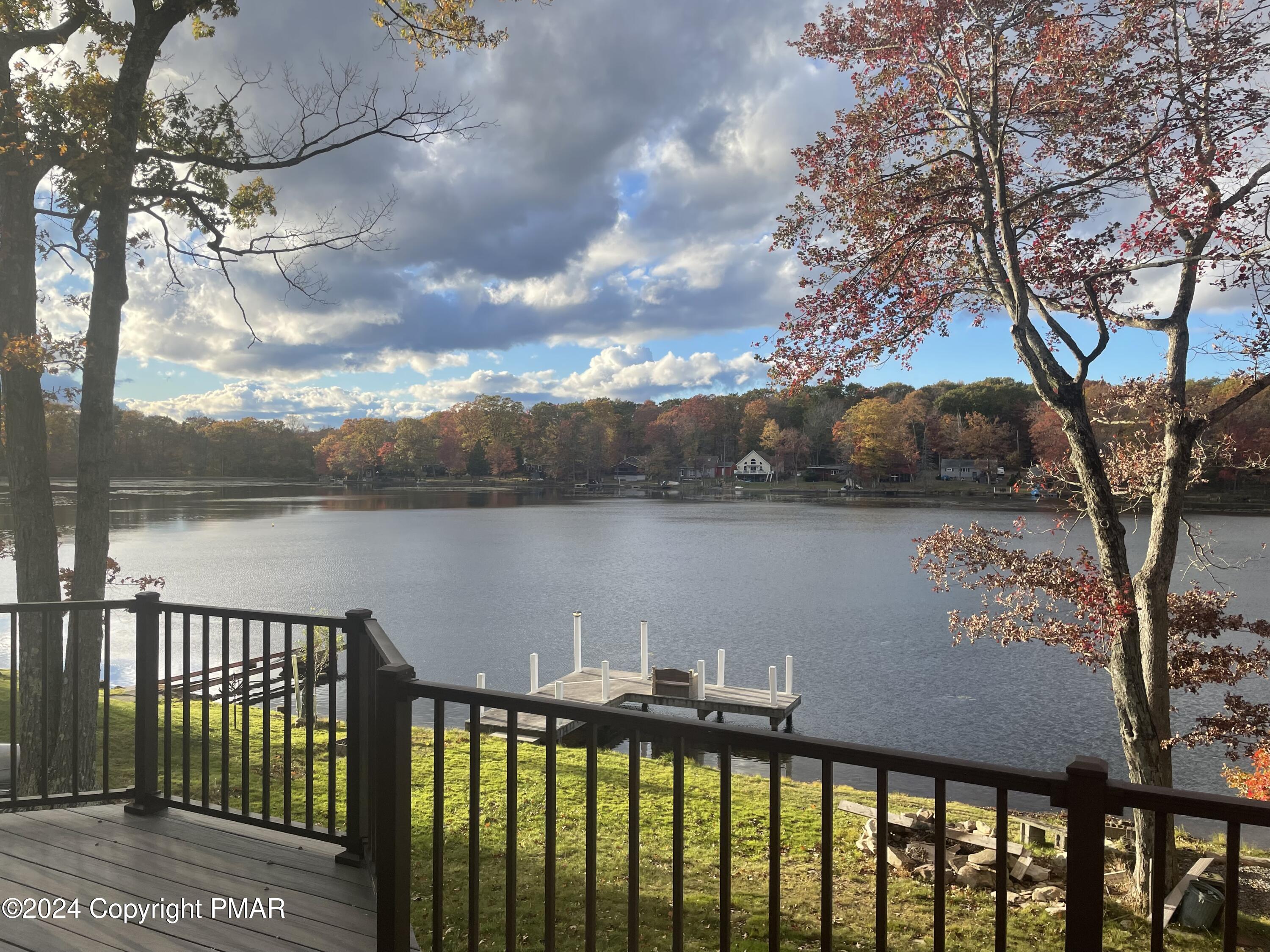 a view of a lake from a balcony