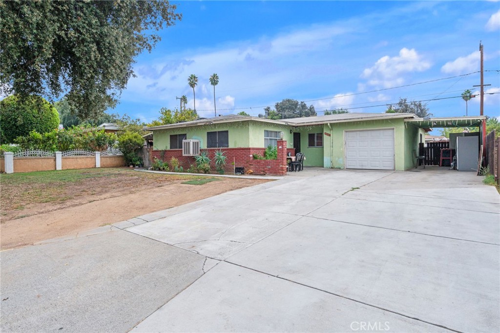 front view of a house with a patio