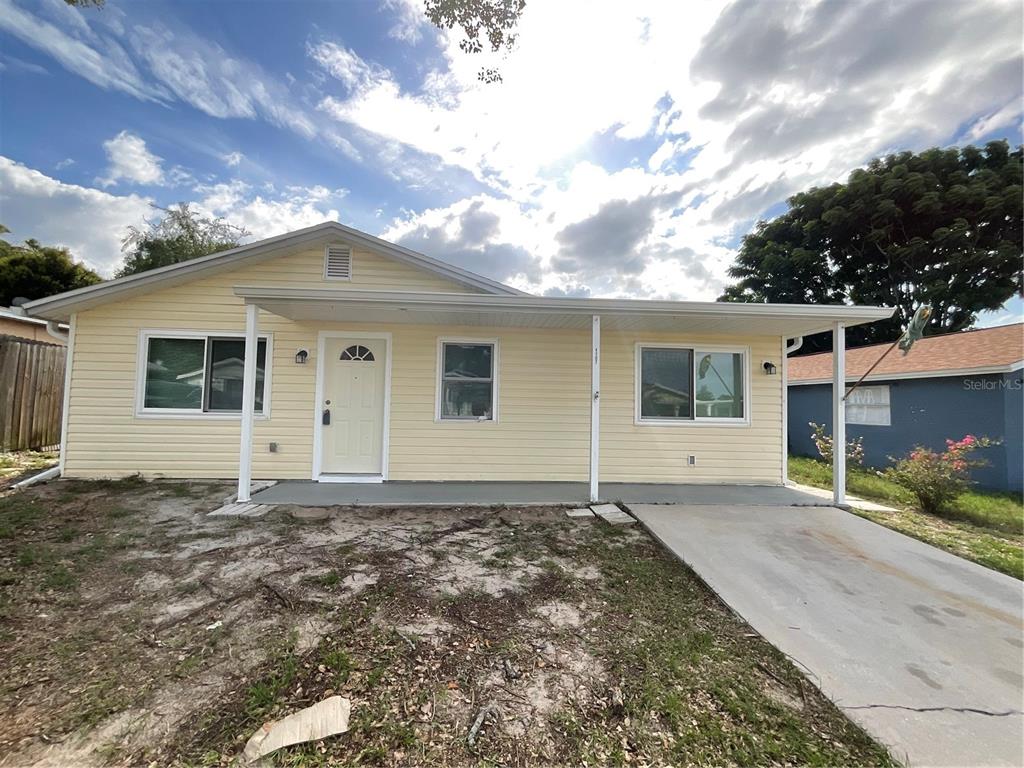 front view of house with a yard