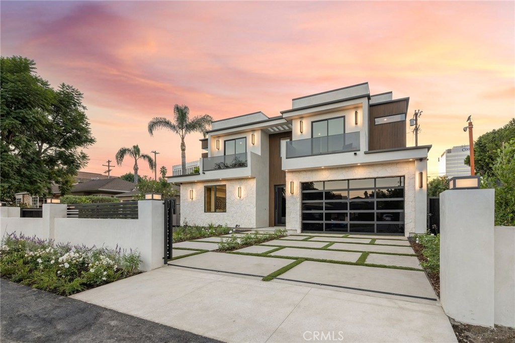 a house view with a garden space