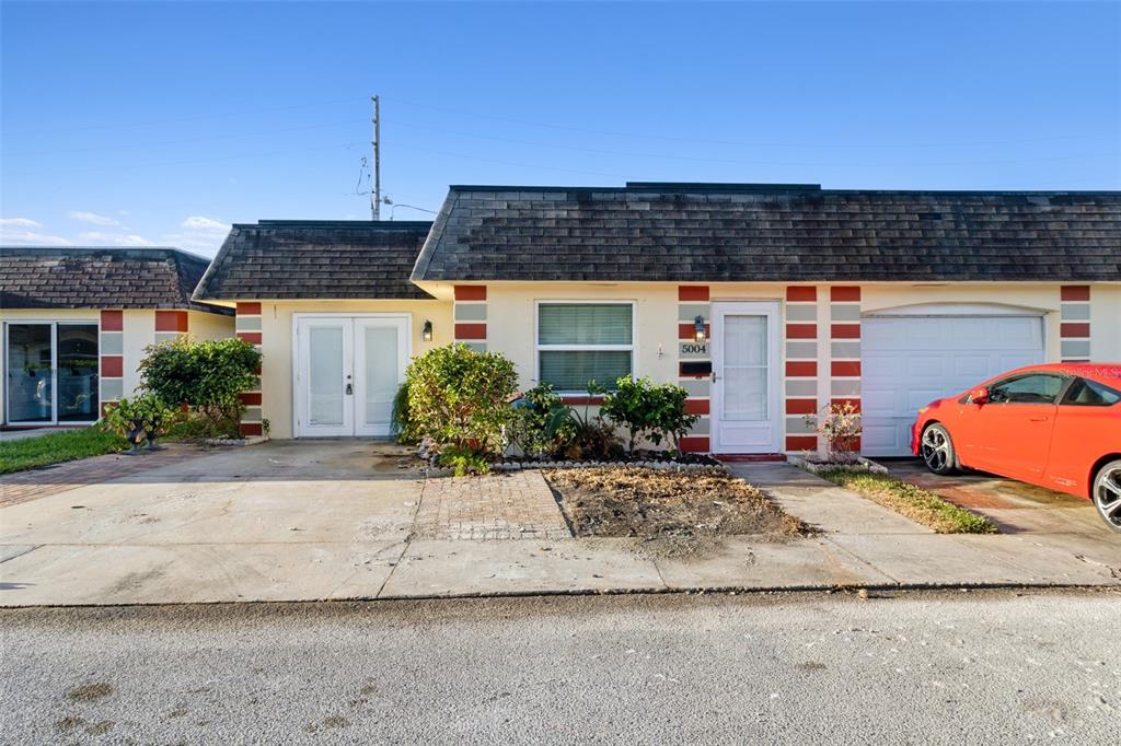 a view of a house with a patio