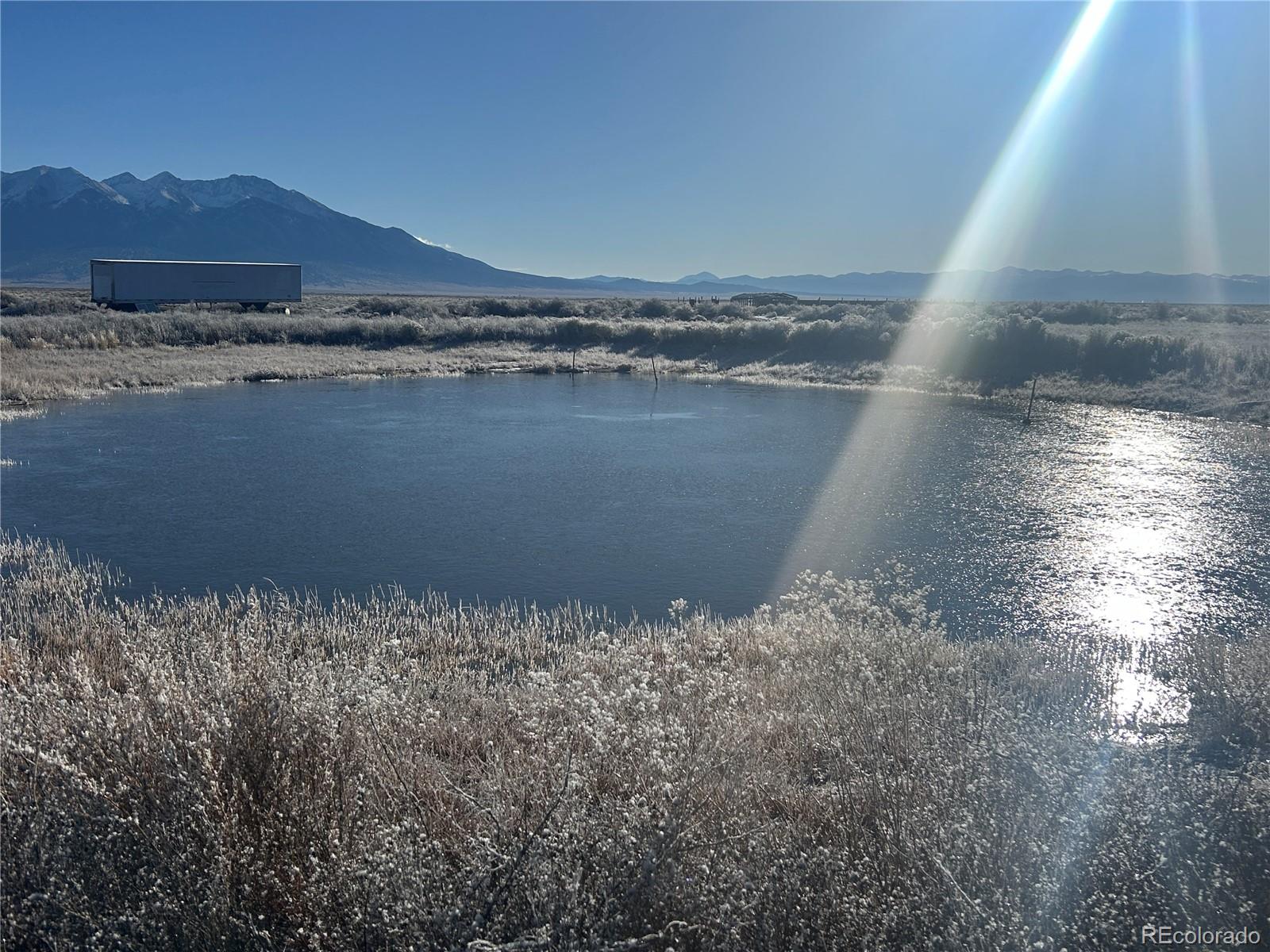 a view of lake and mountain