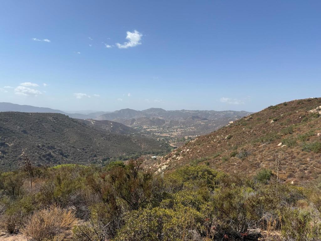 a view of mountains and valleys