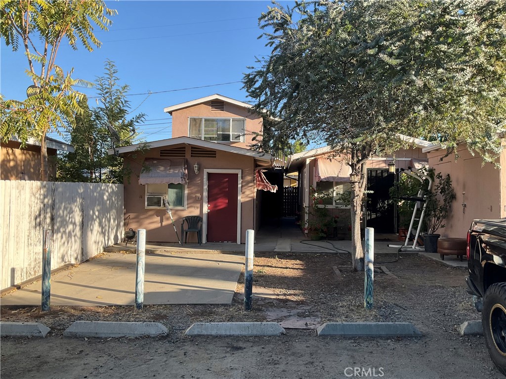 a front view of a house with parking