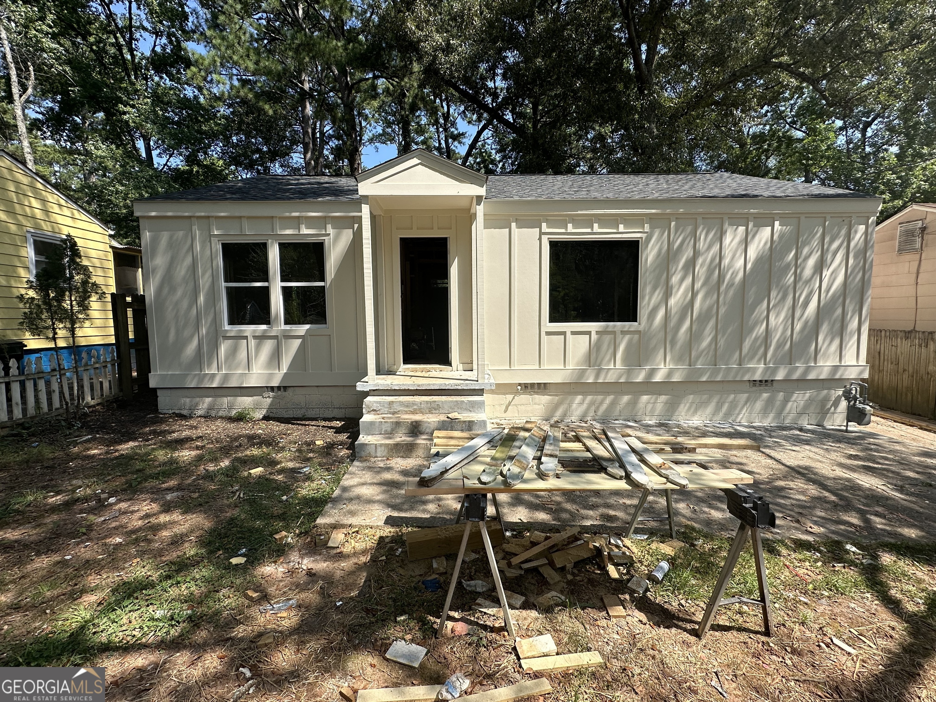 a front view of a house with patio