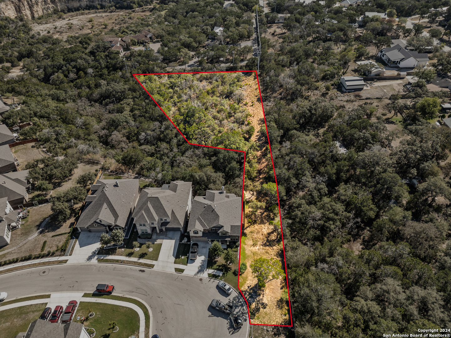 an aerial view of residential house with outdoor space