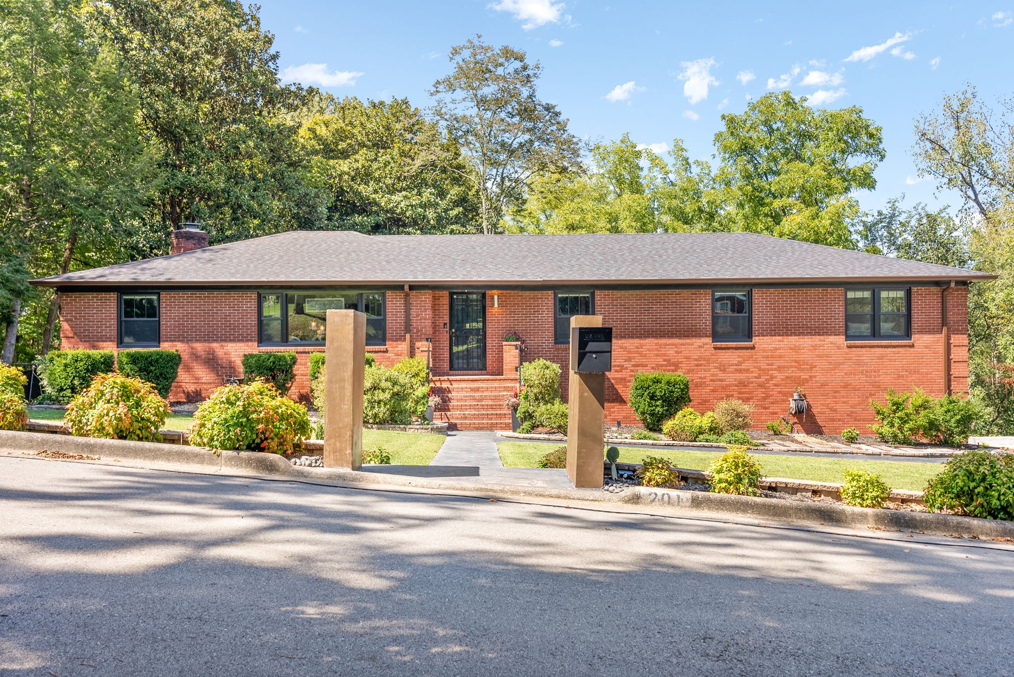 front view of a house with a small yard