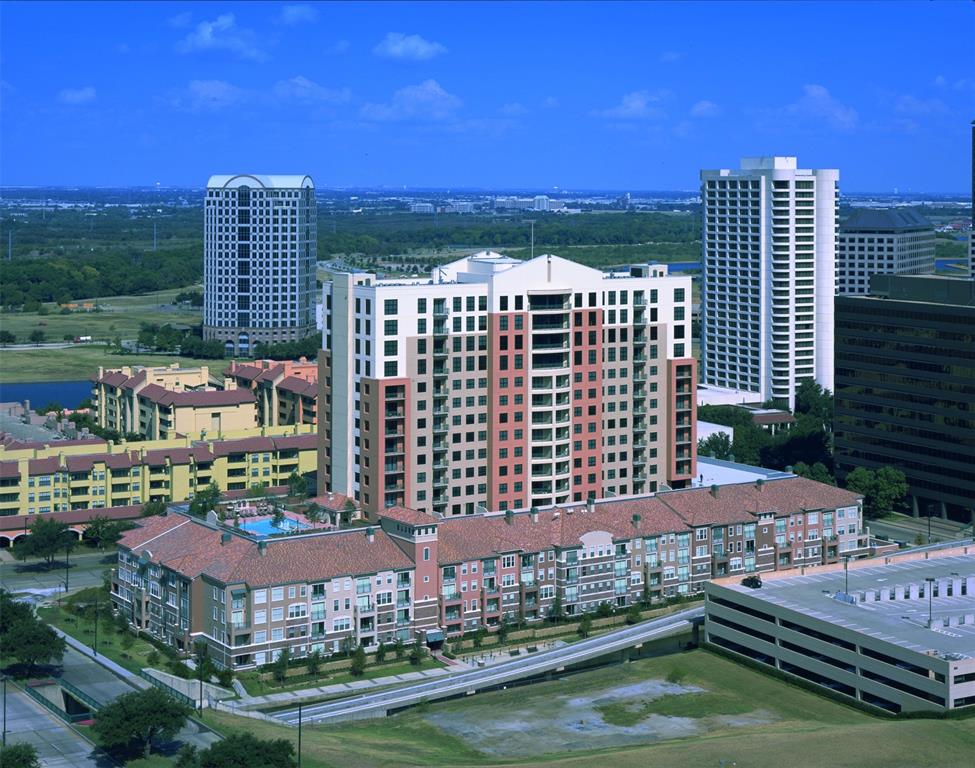 a view of a city with tall buildings