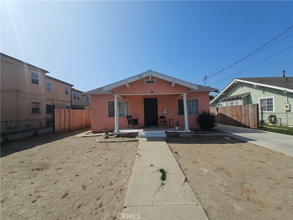 a front view of a house with a patio