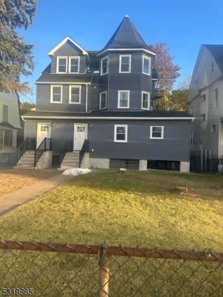 a front view of a house with swimming pool