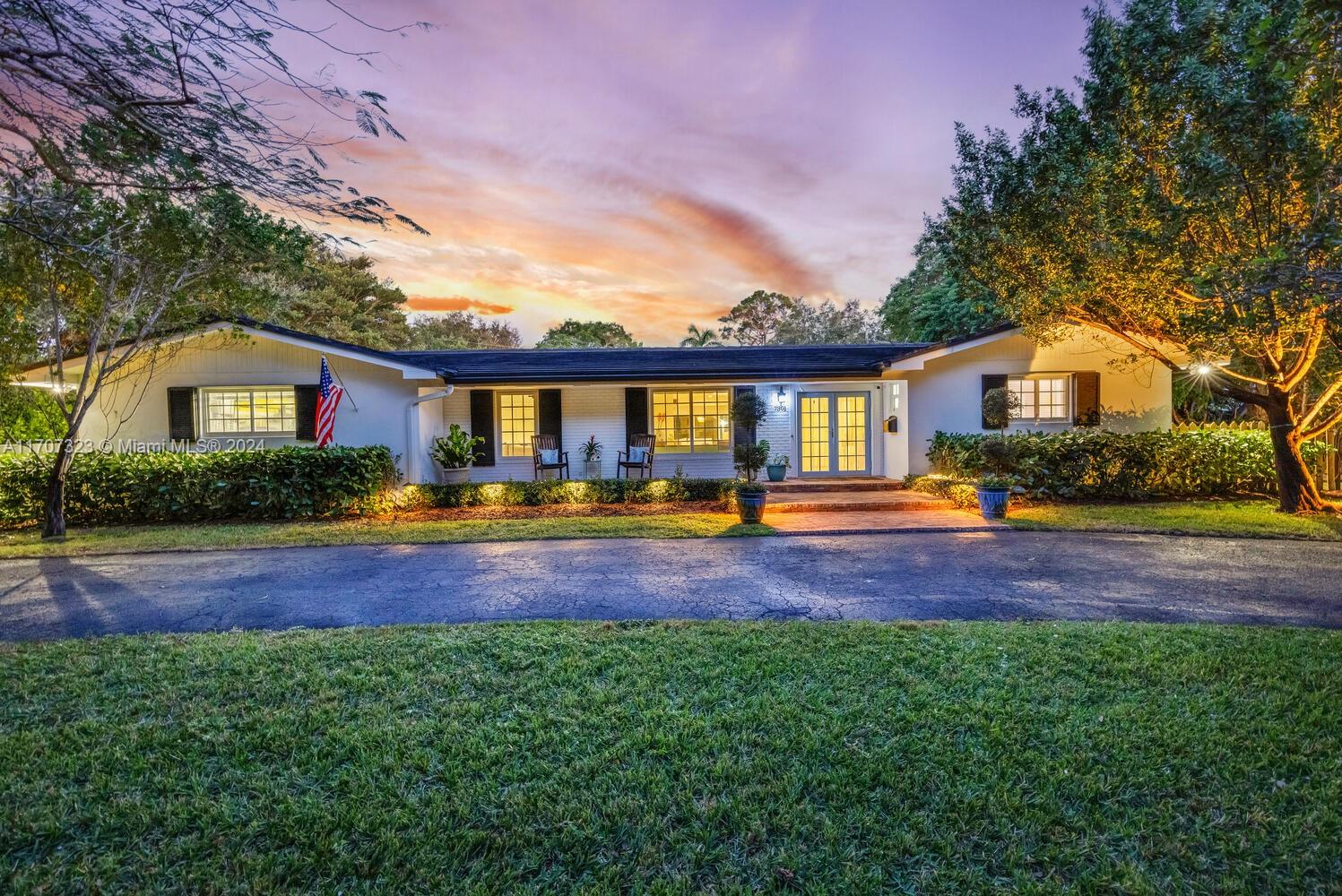 a view of house with yard and outdoor space