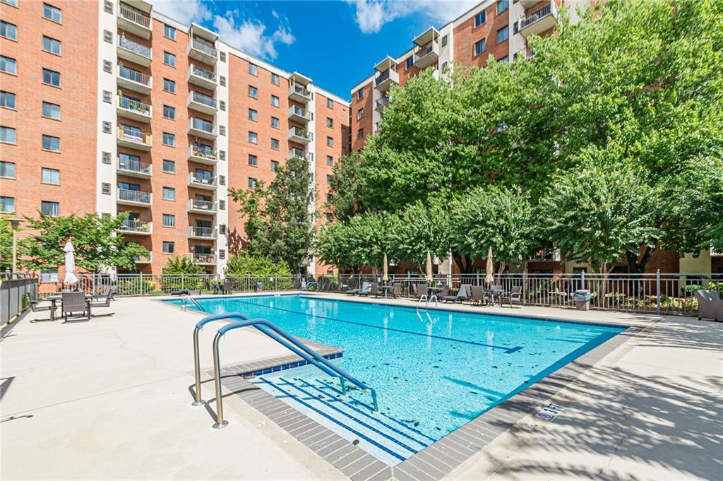 a view of swimming pool with a patio