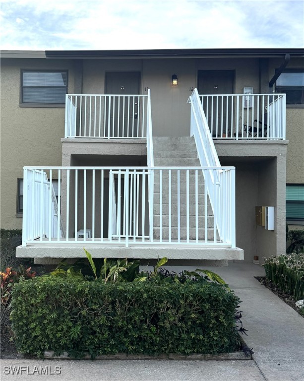 a balcony with a furniture