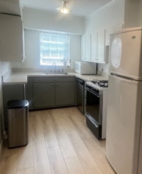 a kitchen with a stove and a refrigerator