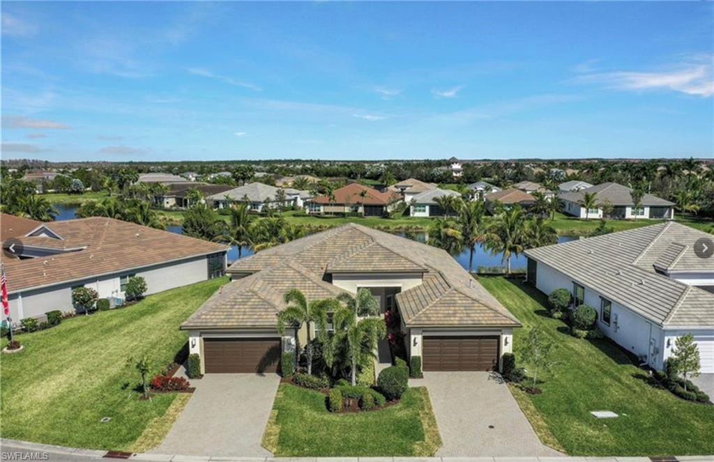 an aerial view of a house with a garden view