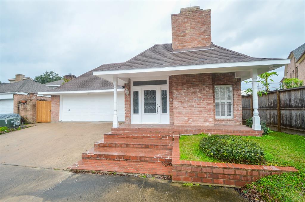 front view of house with a yard