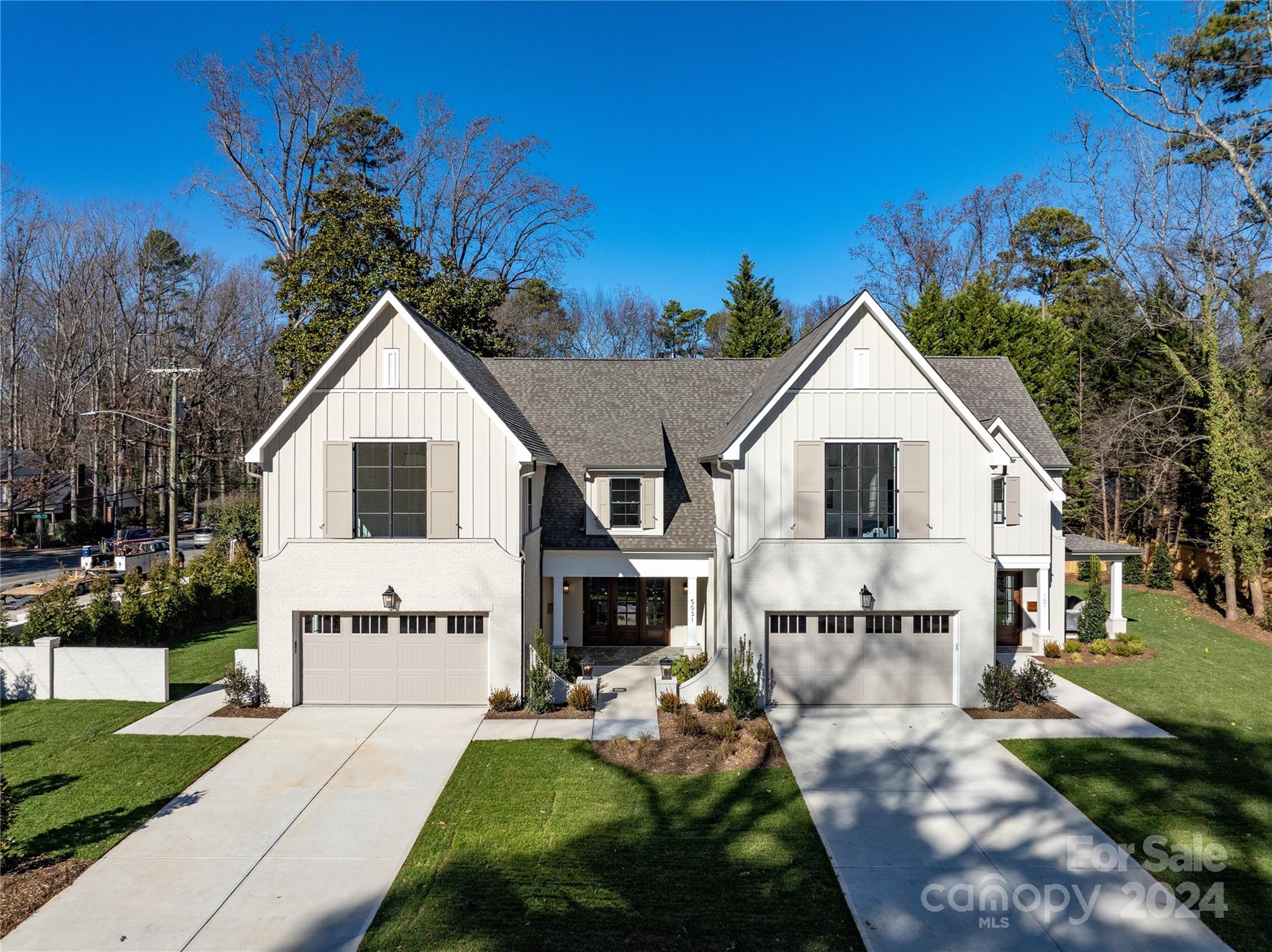 a view of house that has a yard