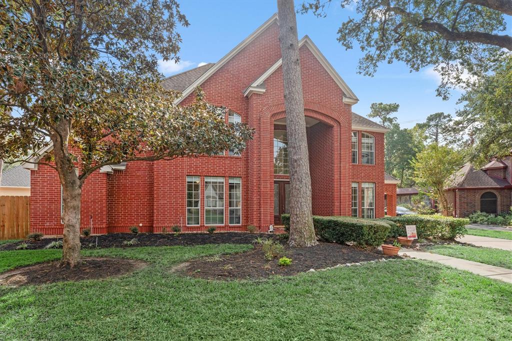 front view of house with a yard