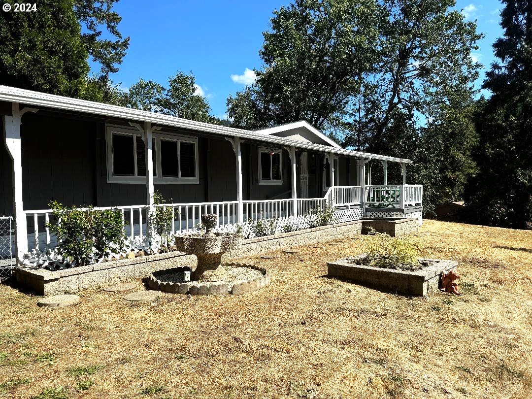 a view of a house with chairs in patio