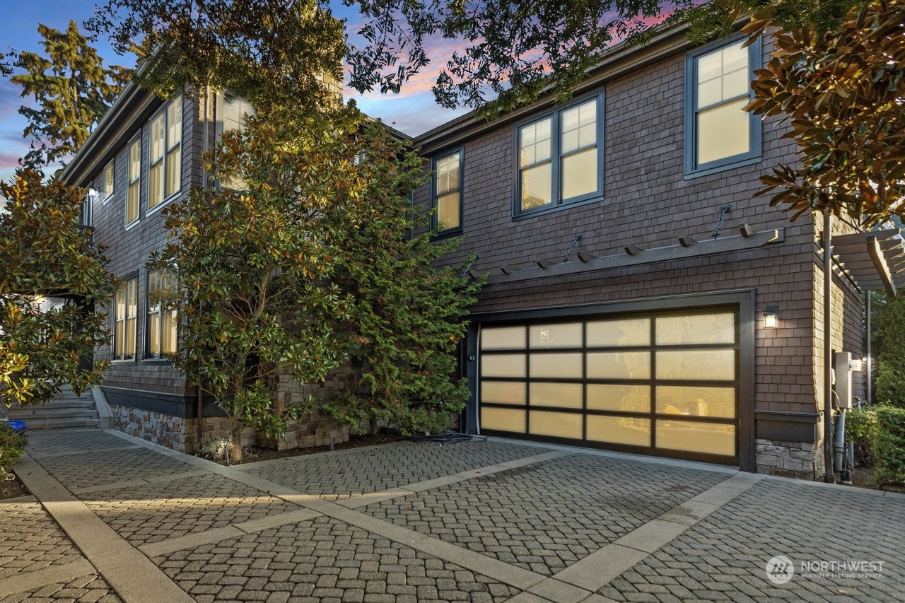 a view of a brick house with a outdoor space