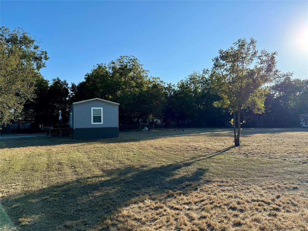 a house with trees in the background