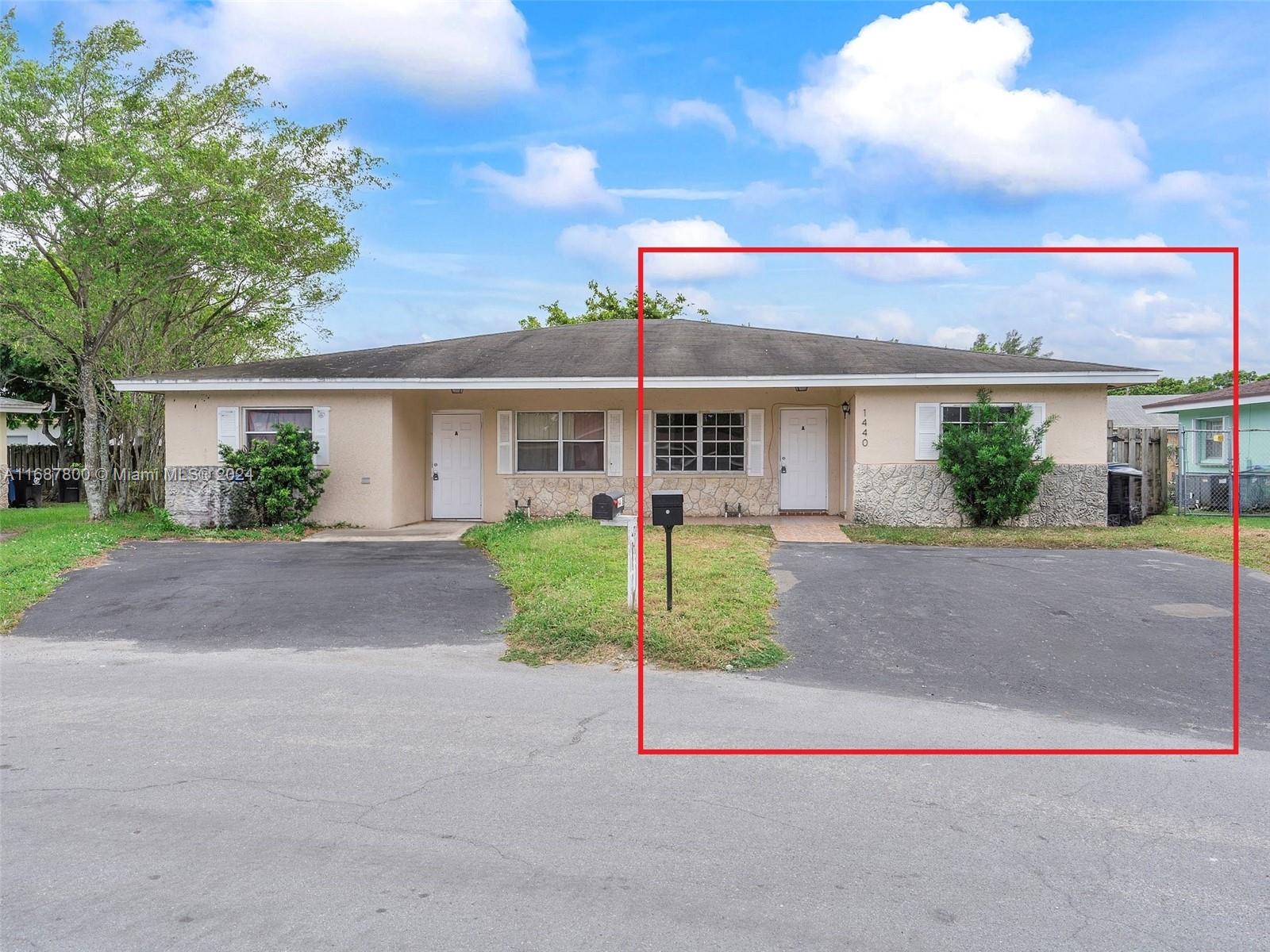 front view of house with a yard